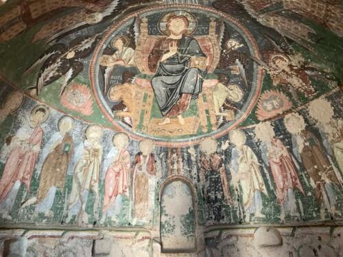 Inside an stone carved church. They eyes of the figures where destroyed when Muslim (Ottoman) took over the region. 